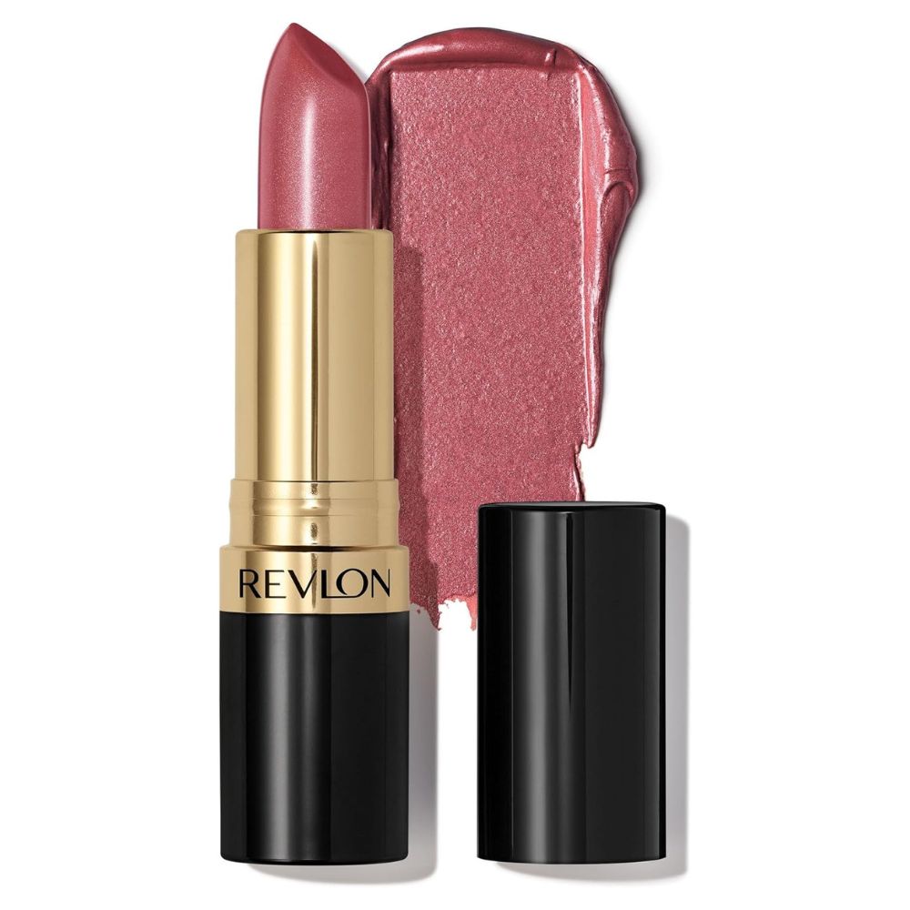 A Revlon lipstick in a dusty rose pink shade, shown with the gold and black tube, the removed cap, and a textured smear of the lipstick on a white background.
