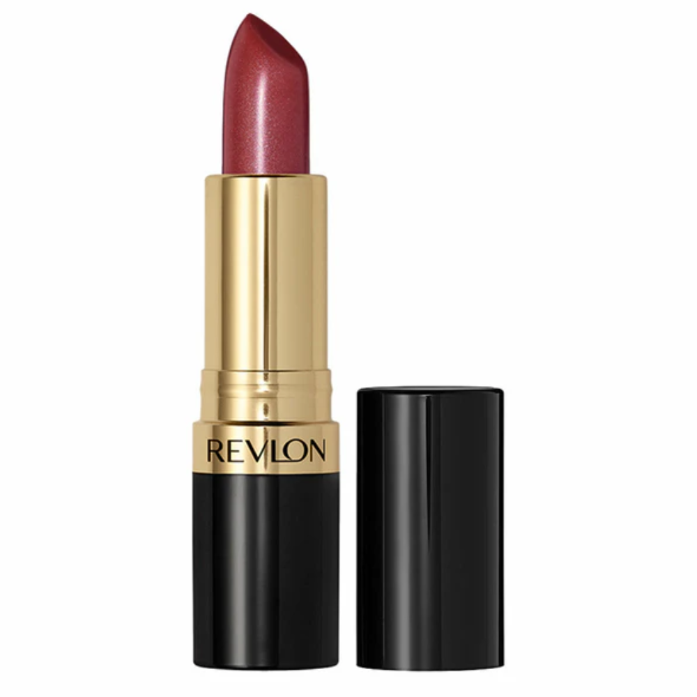 A Revlon lipstick in a deep berry red shade, shown with its gold and black tube open and the cap placed beside it on a plain white background.